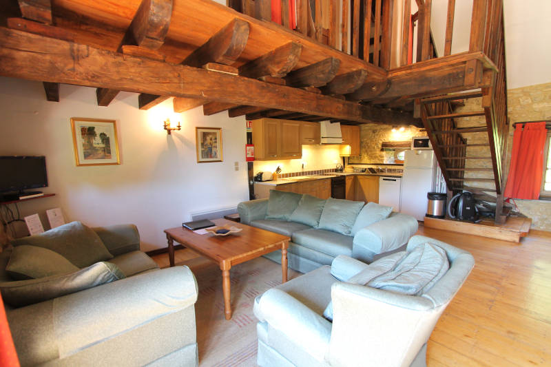 sofas table and wooden beams